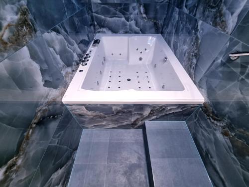 Suite exclusiva con jacuzzi del hotel NOX - Bayswater. Foto 7