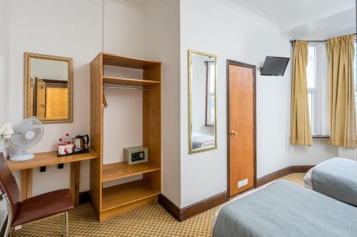 Habitación Doble Estándar - 2 camas del hotel Oyo Abbey , London Shepherd's Bush Market. Foto 4