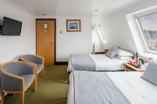 Habitación Doble Estándar - 2 camas del hotel Oyo Abbey , London Shepherd's Bush Market. Foto 8