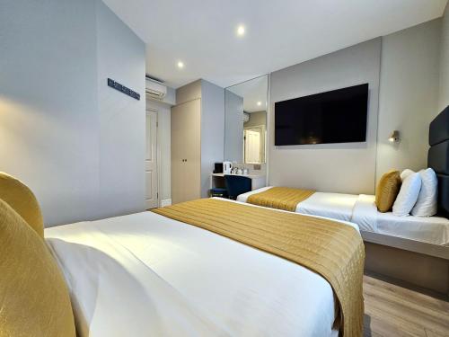 Habitación Triple del hotel NOX HOTELS - Hyde Park. Foto 4