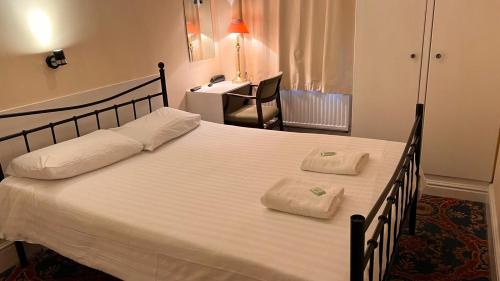 Habitación Doble con baño privado del hotel Gresham Bloomsbury. Foto 1