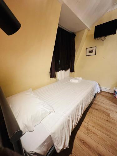 Habitación Individual con baño privado del hotel Gresham Bloomsbury. Foto 2