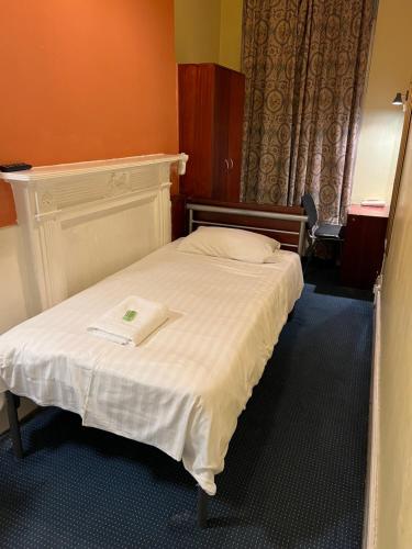 Habitación Individual con baño compartido del hotel Gresham Bloomsbury. Foto 2