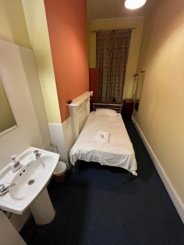 Habitación Individual con baño compartido del hotel Gresham Bloomsbury. Foto 3