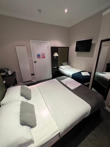 Habitación Cuádruple Executive del hotel Goodwood. Foto 1