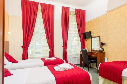 Habitación Triple del hotel Avonmore Cartwright Gardens