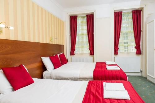 Habitación Triple del hotel Avonmore Cartwright Gardens. Foto 1