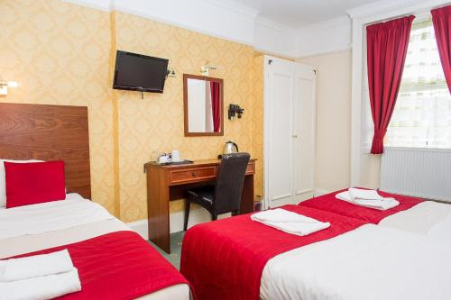 Habitación cuádruple del hotel Avonmore Cartwright Gardens. Foto 3