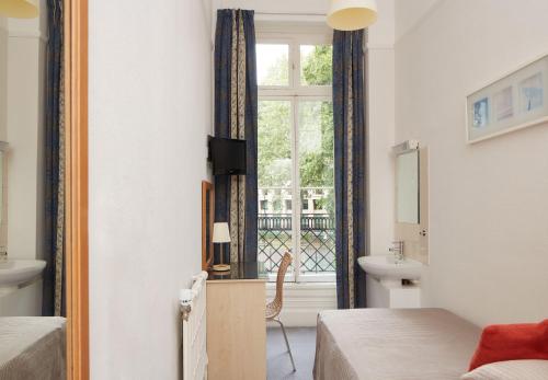 Habitación Individual Estándar con baño externo del hotel Euro. Foto 3