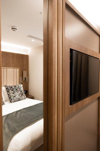 Habitación Doble Económica del hotel Merit Kensington. Foto 14