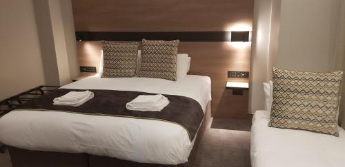 Habitación Doble Deluxe del hotel Merit Kensington. Foto 19