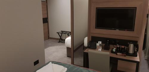 Habitación Cuádruple Superior del hotel Merit Kensington. Foto 13