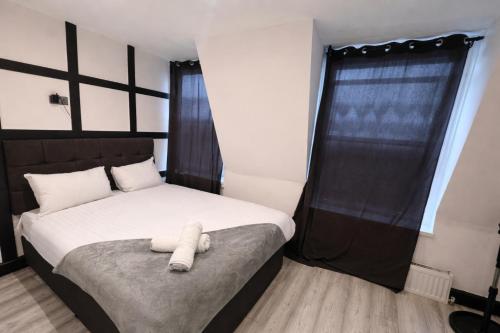 Habitación Triple Deluxe del hotel Oyo Amsterdam. Foto 4
