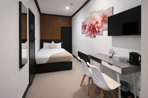 Habitación cuádruple del hotel Oyo Amsterdam. Foto 2