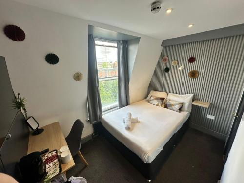 Habitación doble 1 Cama Individual del hotel Oyo Amsterdam. Foto 9