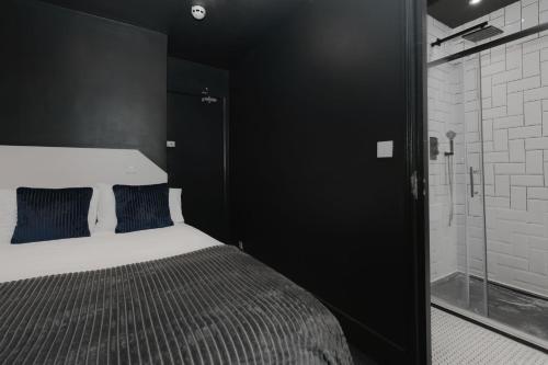 Habitación doble 1 Cama Individual del hotel Oyo Amsterdam. Foto 7