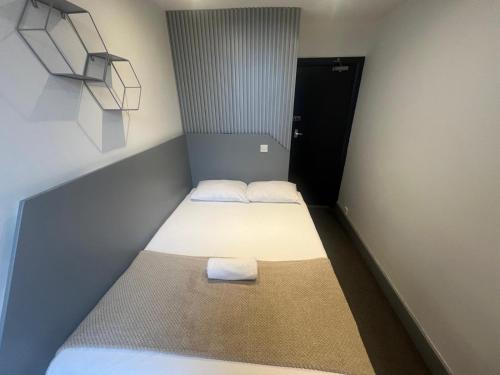 Habitación doble 1 Cama Individual del hotel Oyo Amsterdam. Foto 30