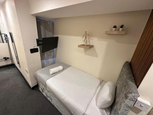 Habitación Individual Estándar del hotel Oyo Amsterdam. Foto 9