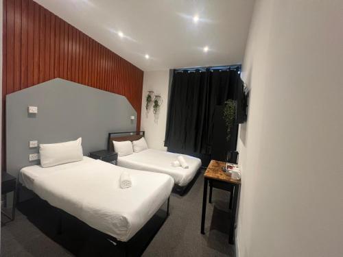 Habitación Triple Deluxe del hotel Oyo Amsterdam. Foto 11