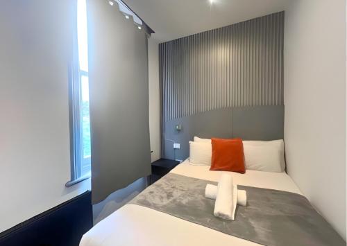 Habitación Triple Deluxe del hotel Oyo Amsterdam. Foto 33