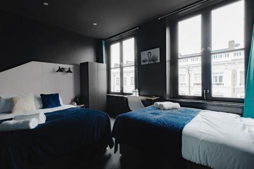 Habitación cuádruple del hotel Oyo Amsterdam. Foto 3