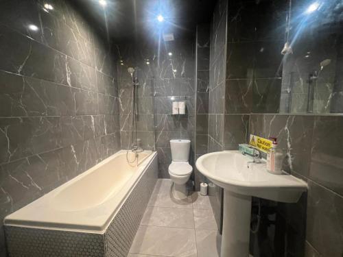 Habitación cuádruple del hotel Oyo Amsterdam. Foto 6