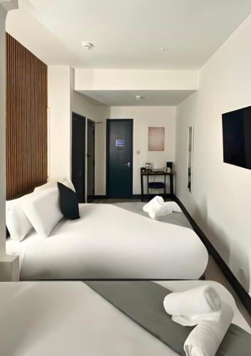 Habitación cuádruple del hotel Oyo Amsterdam. Foto 10