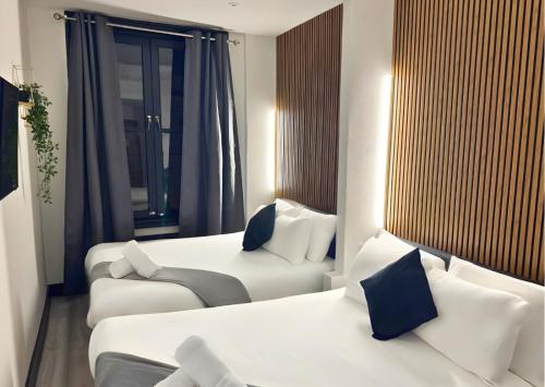 Habitación cuádruple del hotel Oyo Amsterdam. Foto 11