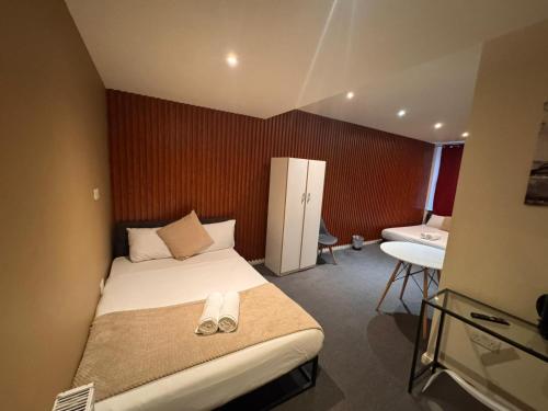 Habitación cuádruple del hotel Oyo Amsterdam. Foto 13