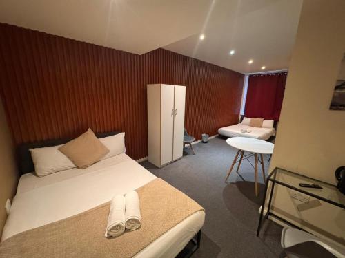 Habitación cuádruple del hotel Oyo Amsterdam. Foto 14