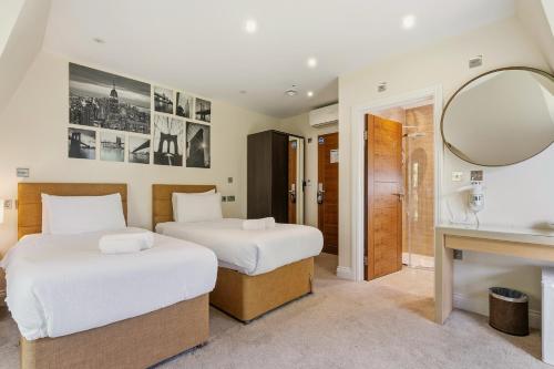 Habitación Doble Deluxe - 2 camas del hotel London Star. Foto 1