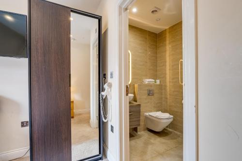 Habitación Doble Deluxe - 2 camas del hotel London Star. Foto 2