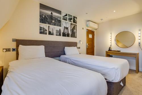 Habitación Doble Deluxe - 2 camas del hotel London Star. Foto 8