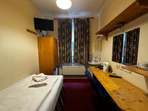 Habitación Individual con baño compartido del hotel Bridge Park. Foto 4