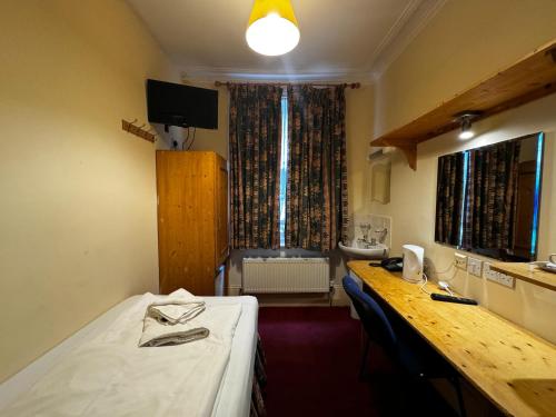 Habitación Individual con baño compartido del hotel Bridge Park. Foto 5