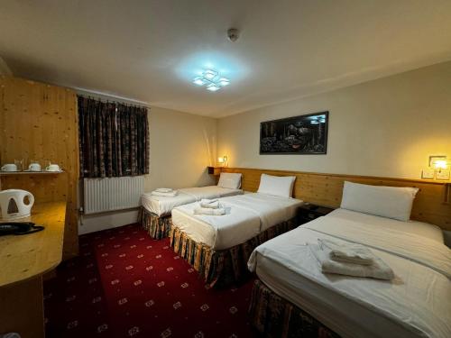 Habitación Triple con baño privado (3 camas individuales) del hotel Bridge Park. Foto 10