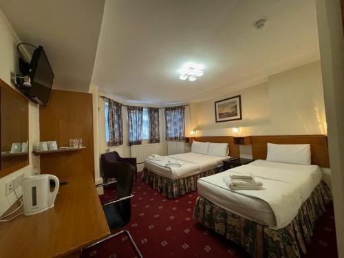 Habitación Triple con baño privado - 1 cama doble y 1 cama individual del hotel Bridge Park