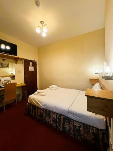 Habitación Cuádruple con baño privado del hotel Bridge Park. Foto 9