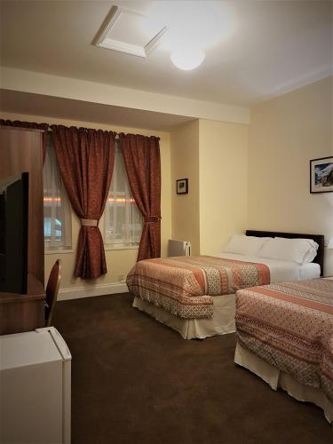 Habitación Doble - 2 camas del hotel The Gateway. Foto 3