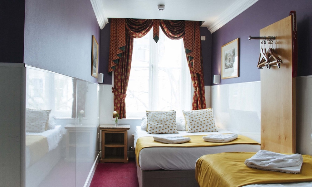 Habitación Triple del hotel Lord Kensington. Foto 6
