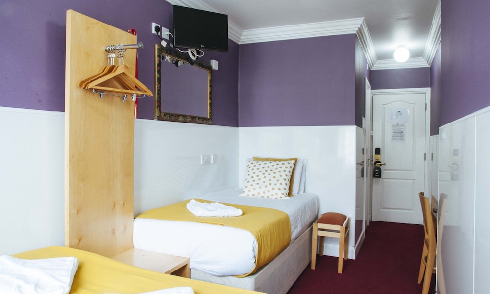 Habitación Triple del hotel Lord Kensington. Foto 10