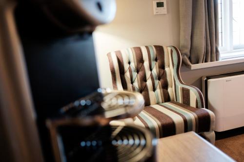 Habitación Deluxe con 1 cama extragrande o 2 individuales del hotel The White Hart. Foto 4