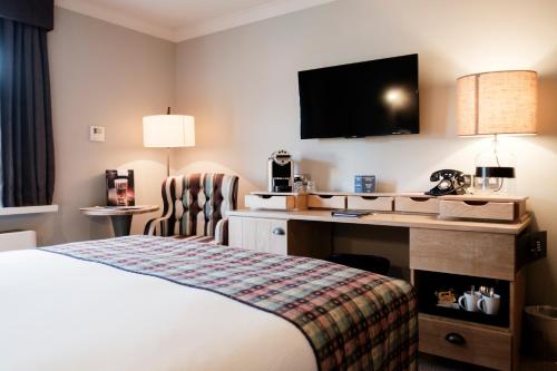 Habitación Deluxe con cama extragrande del hotel The White Hart. Foto 8