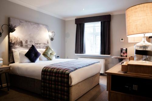 Habitación Deluxe con cama extragrande del hotel The White Hart. Foto 9