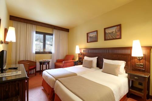 Habitación Cuádruple Estándar del hotel Rvhotels Tuca