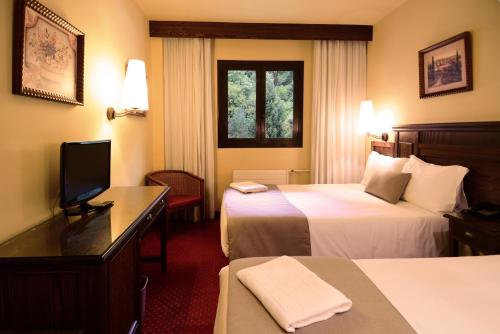 Habitación Cuádruple Estándar del hotel Rvhotels Tuca. Foto 2