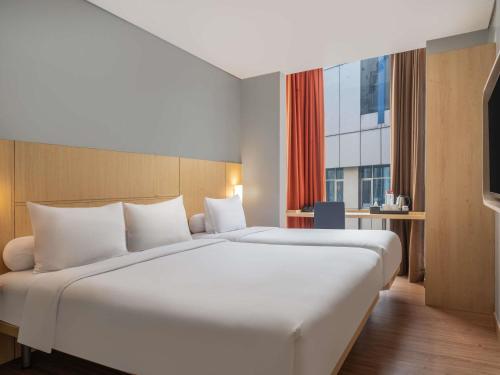 Habitación Estándar - 1 cama doble y 1 individual del hotel Ibis Jakarta Senen