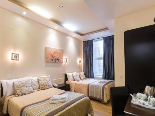 Habitación cuádruple del hotel Notting Hill Gate