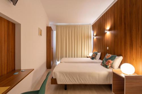 Habitación Doble Estándar - 2 camas del hotel Next Inn. Foto 4