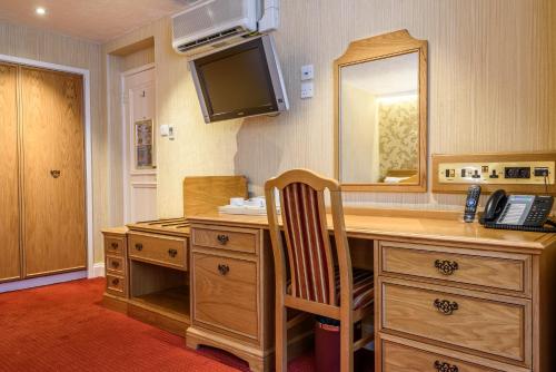 Habitación Triple Clásica del hotel Montana London. Foto 2